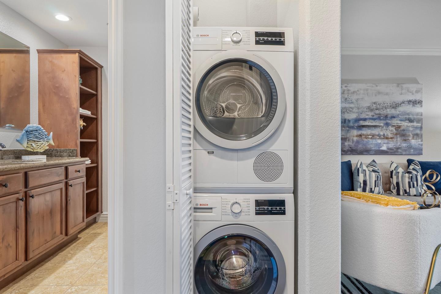 2580 Homestead Road, Unit 5201 Santa Clara, CA 95051 - Photo 13 of 38 a view of a storage & utility room with washer and dryer