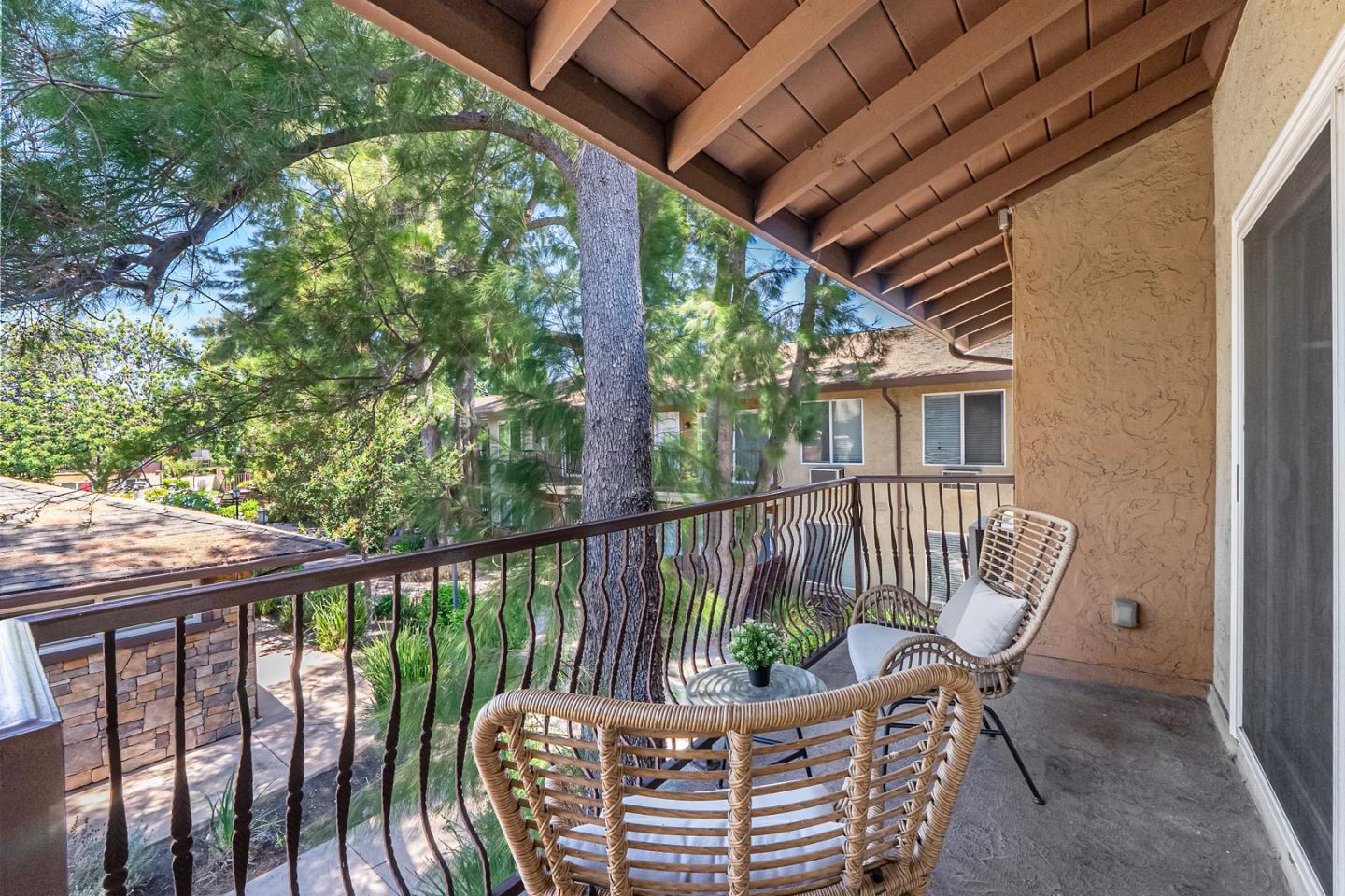 2580 Homestead Road, Unit 5201 Santa Clara, CA 95051 - Photo 20 of 38 a view of a chair in wooden deck