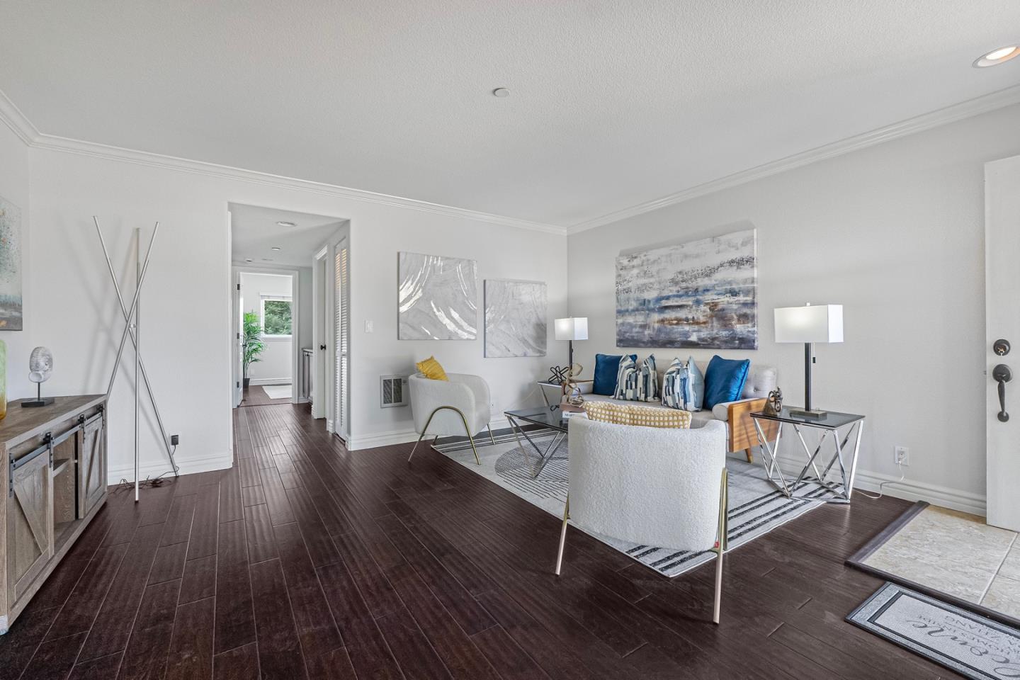 2580 Homestead Road, Unit 5201 Santa Clara, CA 95051 - Photo 2 of 38 a living room with furniture and a wooden floor