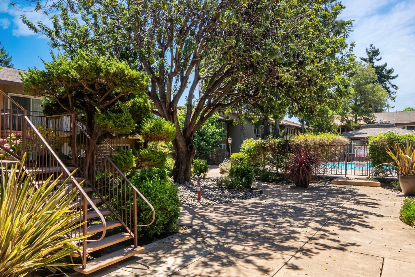 2580 Homestead Road, Unit 5201 Santa Clara, CA 95051 - Photo 24 of 38 a view of a street with a tree