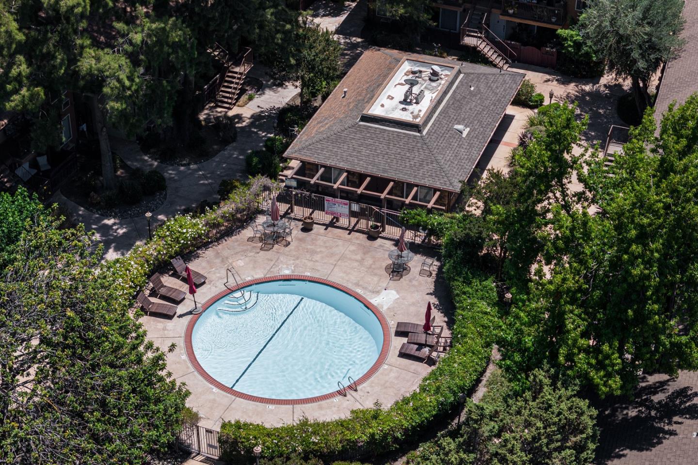 2580 Homestead Road, Unit 5201 Santa Clara, CA 95051 - Photo 32 of 38 an aerial view of a house with garden space and swimming pool