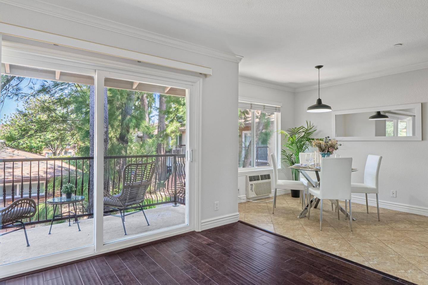 2580 Homestead Road, Unit 5201 Santa Clara, CA 95051 - Photo 5 of 38 a living room with furniture and a floor to ceiling window