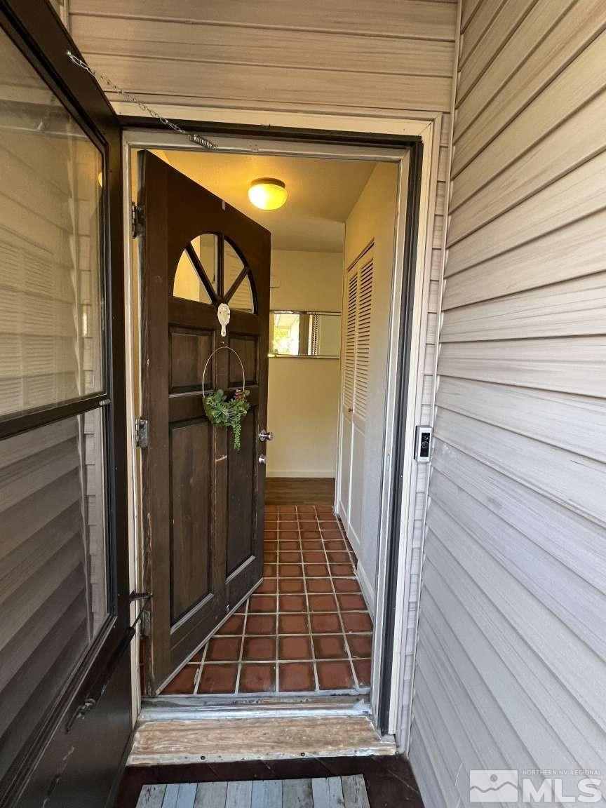 3080 Accacia Way Reno, NV 89503 - Photo 6 of 40 a view of a balcony with wooden floor and staircase