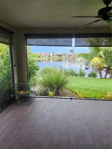 a view of a porch with a yard