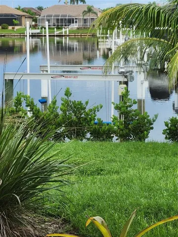 a view of a lake with a building in the background