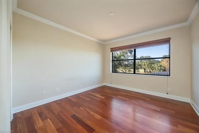 an empty room with window