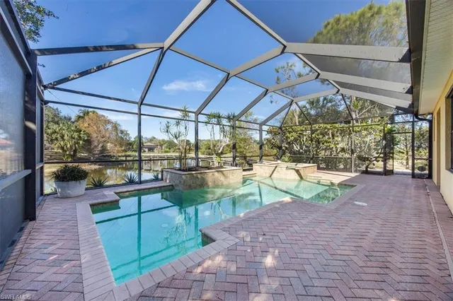 a bathroom with a sink mirror toilet and shower