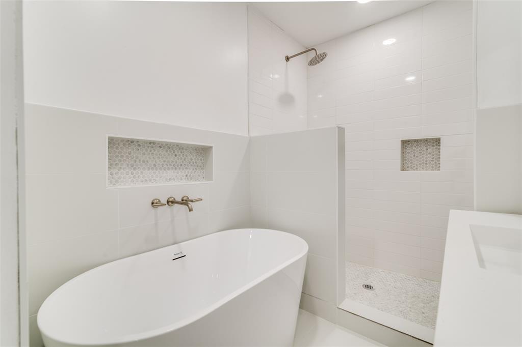 250 Skyview Point, TX 75472 - Photo 14 of 34 a white bath tub sitting next to a white sink