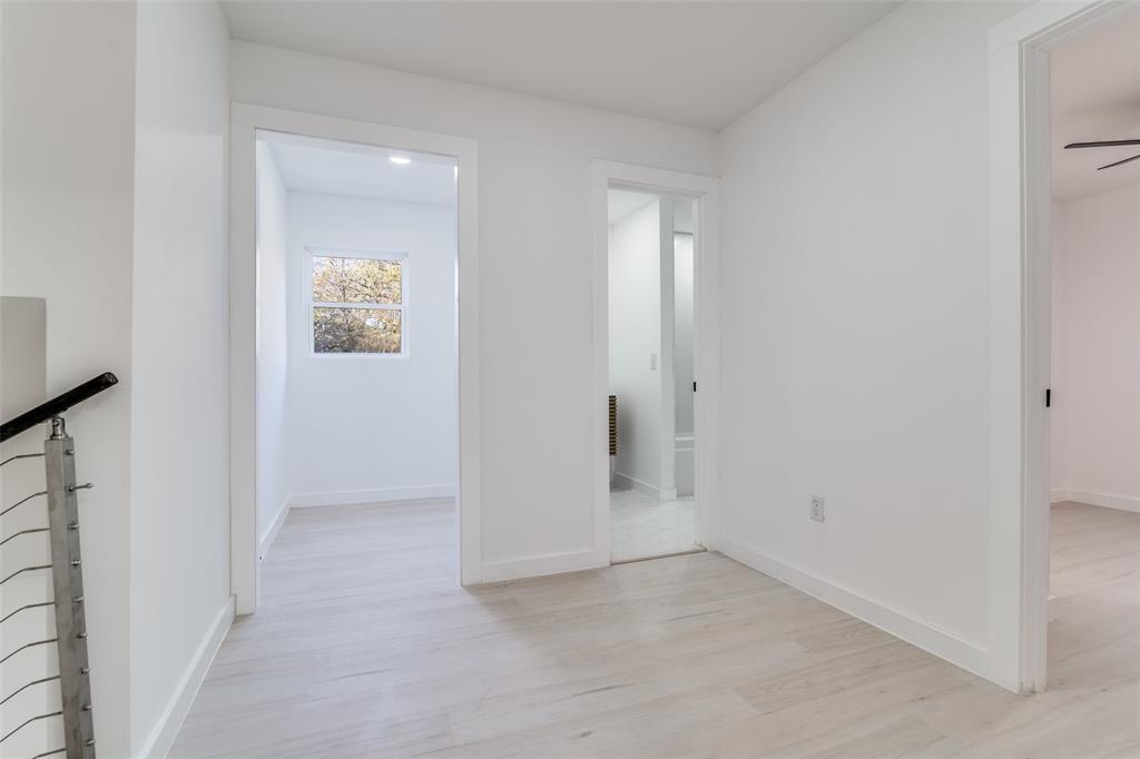 250 Skyview Point, TX 75472 - Photo 19 of 34 an empty room with windows