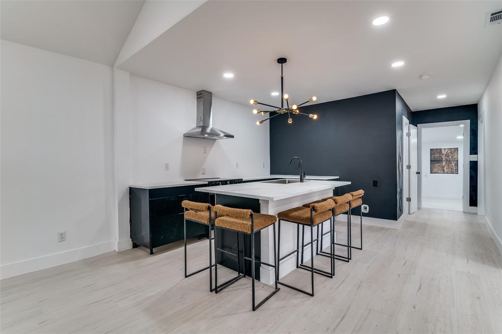 250 Skyview Point, TX 75472 - Photo 4 of 34 a kitchen with a table and chairs in it