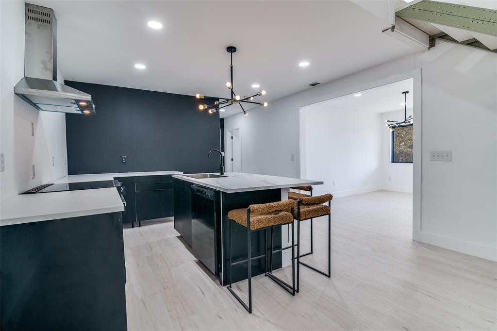 250 Skyview Point, TX 75472 - Photo 5 of 34 a room with table chairs and a chandelier