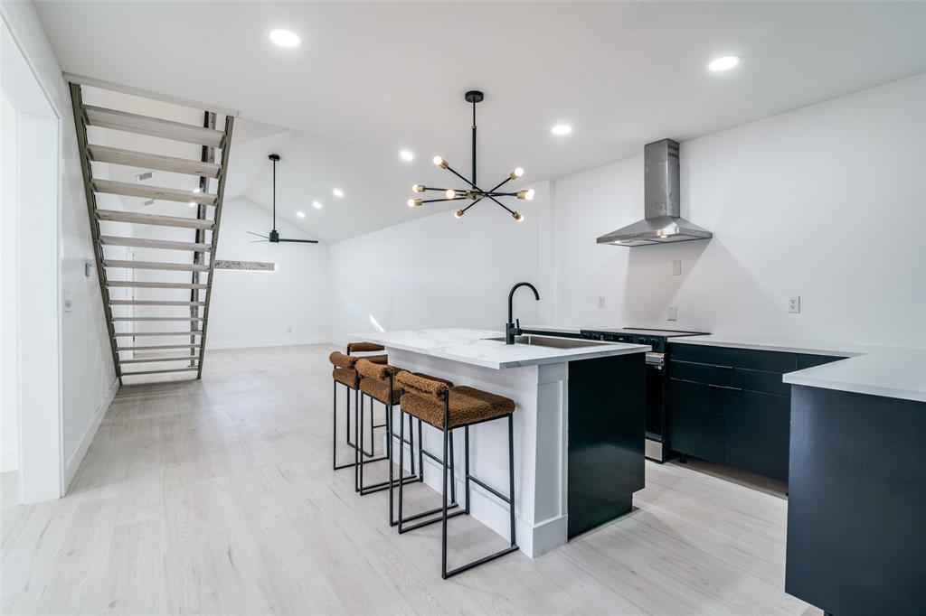 250 Skyview Point, TX 75472 - Photo 6 of 34 a kitchen with a sink cabinets and window