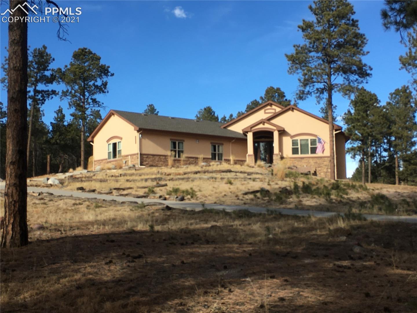 Stucco & stone rancher with finished walkout basement