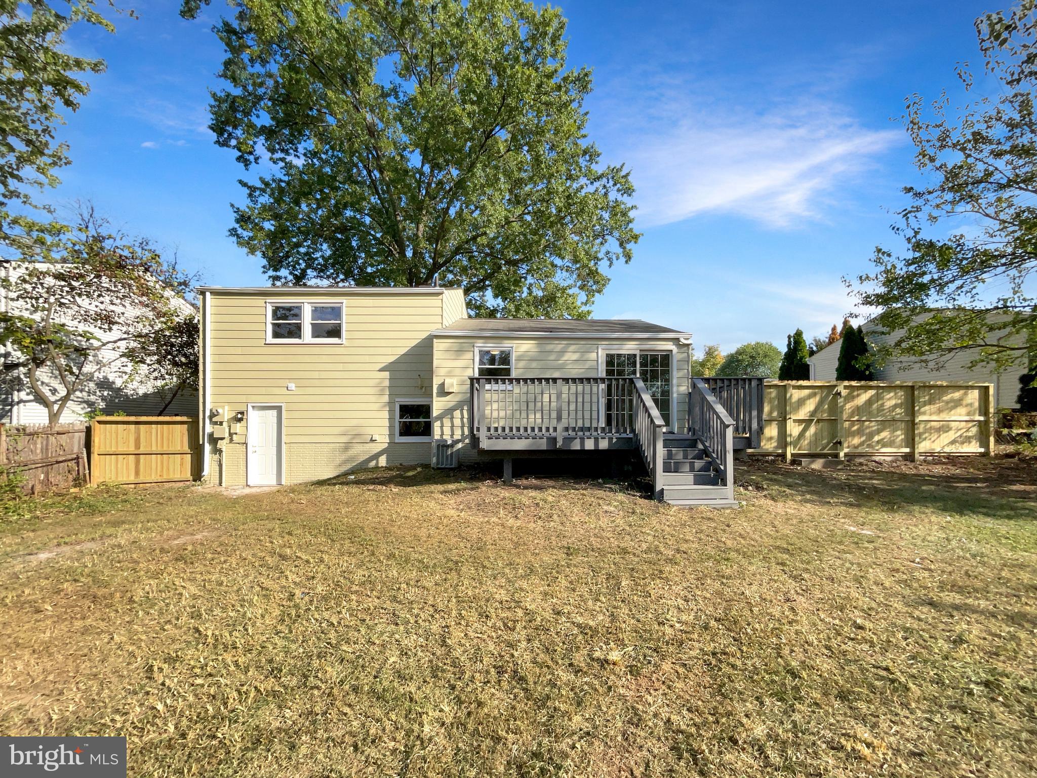 113 North Harrison Road Sterling, VA 20164 - Photo 8 of 19 a view of a house with a yard