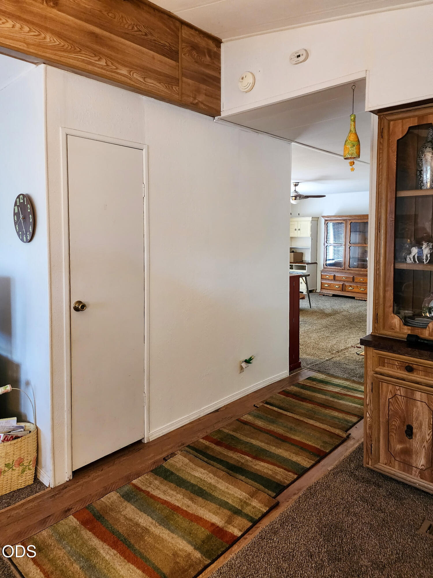 350 Hamilton Avenue Cave Junction, OR 97523 - Photo 5 of 34 a hallway view with a stove and a refrigerator