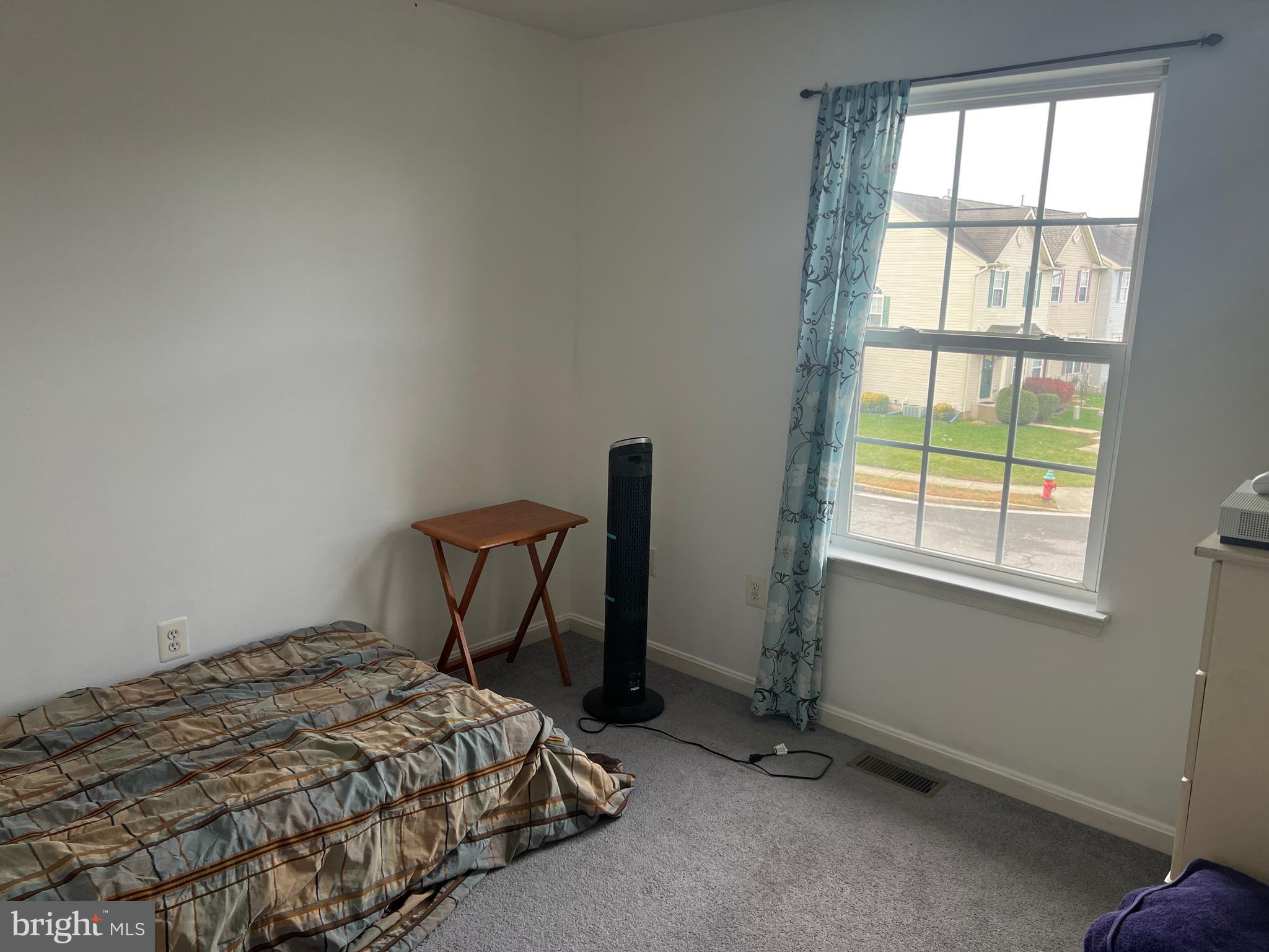 442 Sequoia Drive Smyrna, DE 19977 - Photo 11 of 15 a bedroom with a bed and a window
