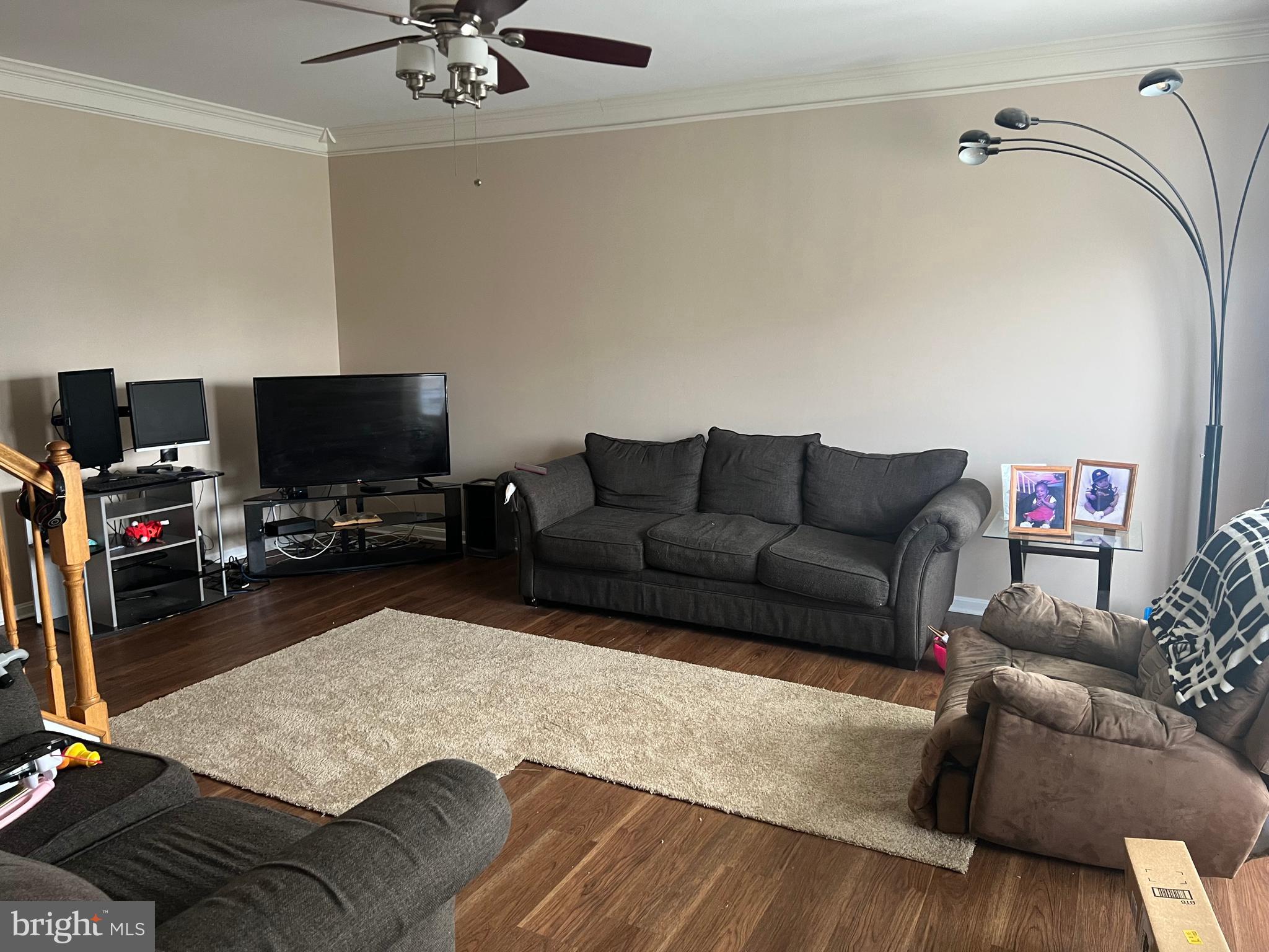 442 Sequoia Drive Smyrna, DE 19977 - Photo 2 of 15 a living room with furniture and a flat screen tv