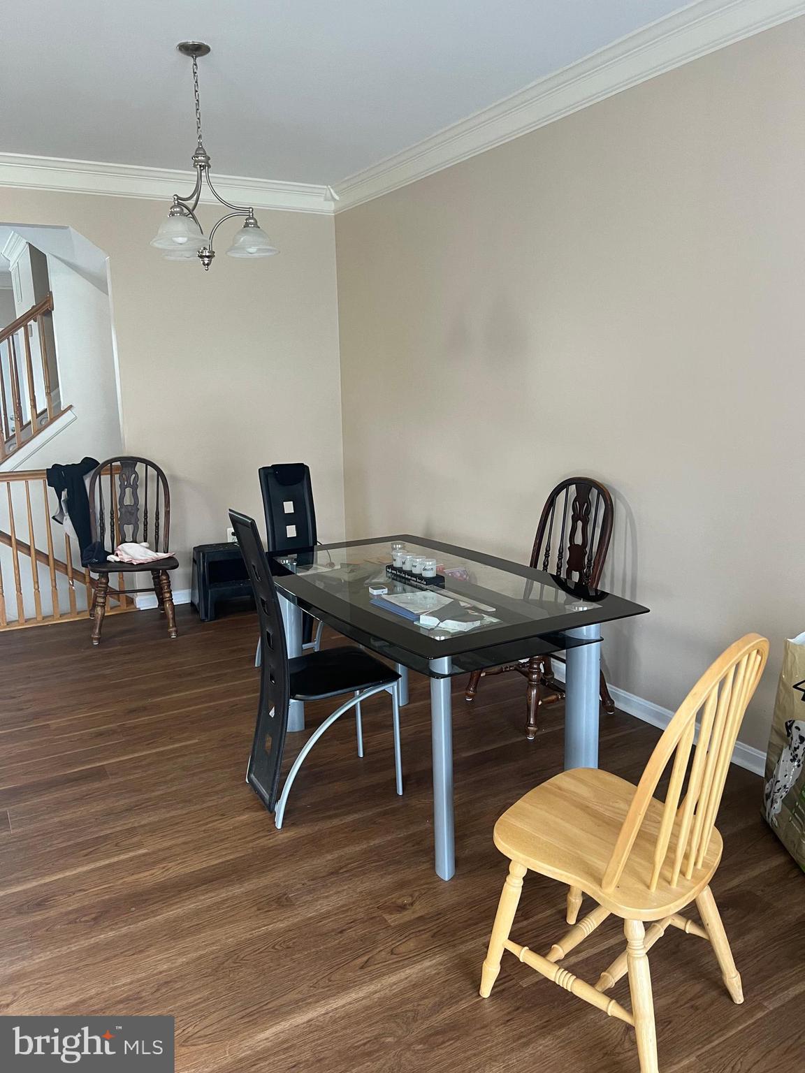 442 Sequoia Drive Smyrna, DE 19977 - Photo 4 of 15 a view of a dining room with furniture and wooden floor