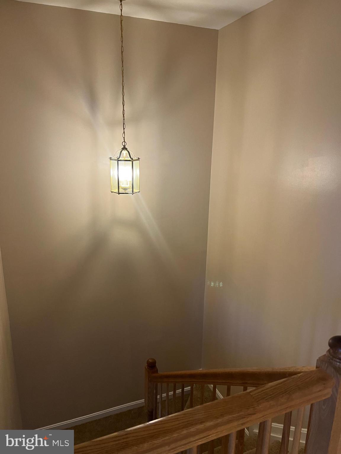 442 Sequoia Drive Smyrna, DE 19977 - Photo 6 of 15 a view of a room with rack on the wall