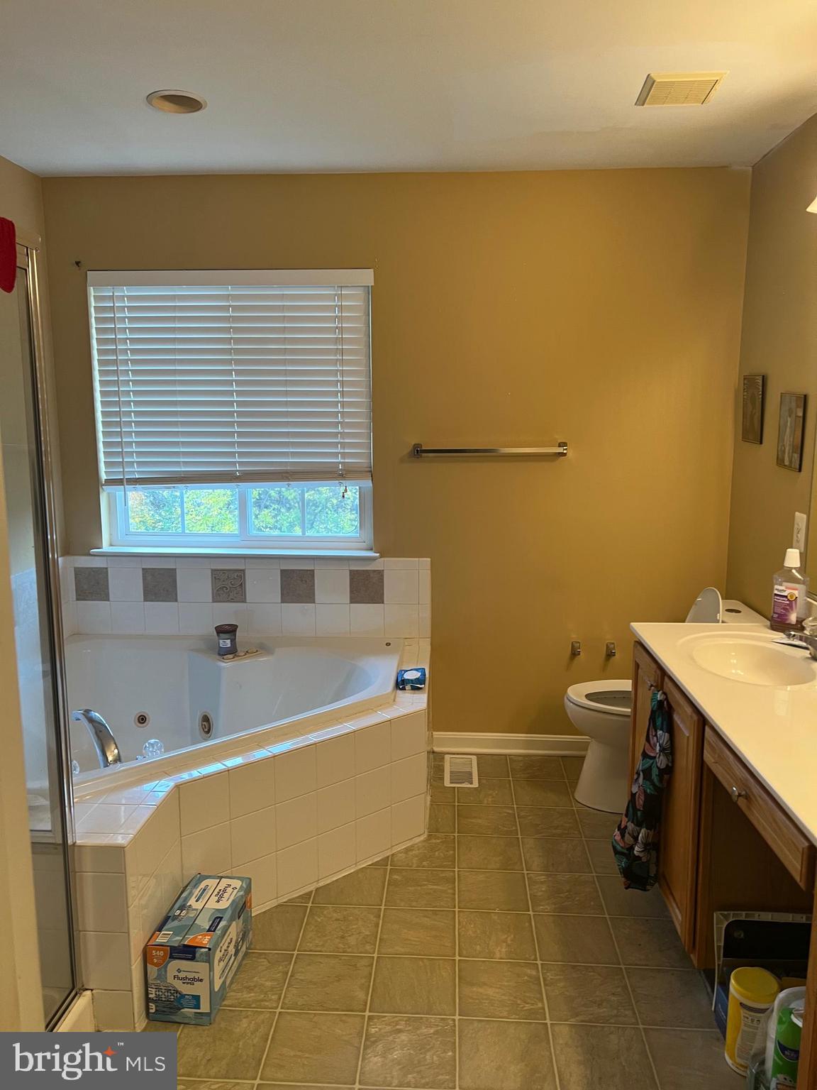 442 Sequoia Drive Smyrna, DE 19977 - Photo 8 of 15 a bathroom with a sink a toilet and a bathtub