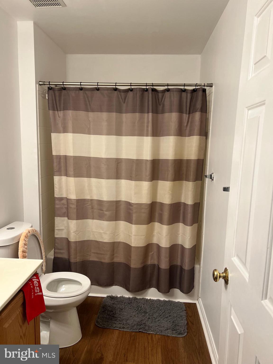 442 Sequoia Drive Smyrna, DE 19977 - Photo 10 of 15 a bathroom with a sink a toilet a shower and a mirror