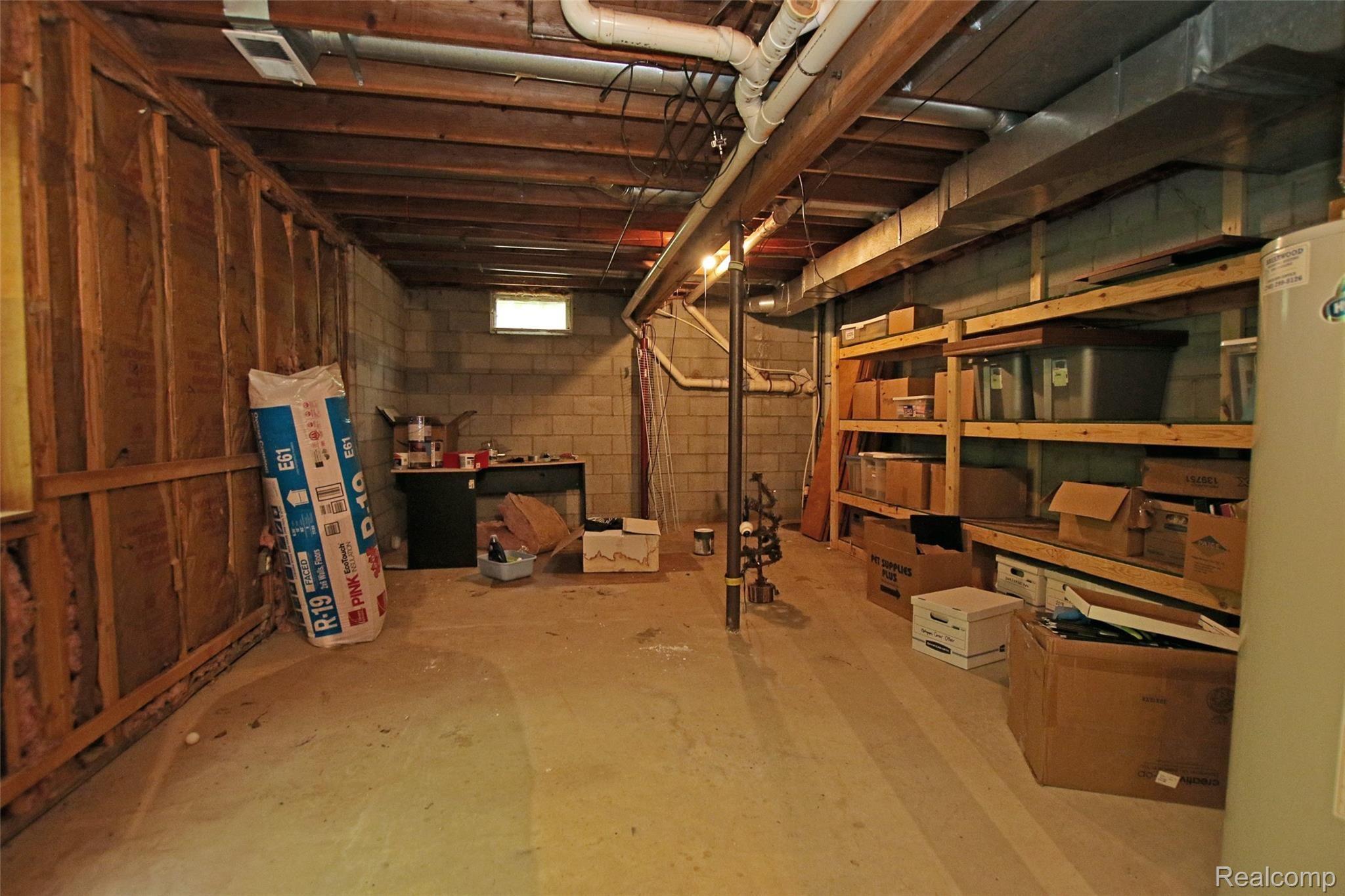 310 North Van Road Holly, MI 48442 - Photo 46 of 75 45) Lower Level Storage Room.jpg