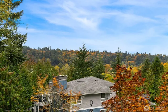 a view of a town with mountains in the background