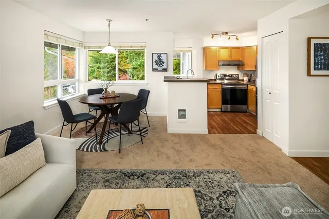 a view of a dining room with furniture window and outside view