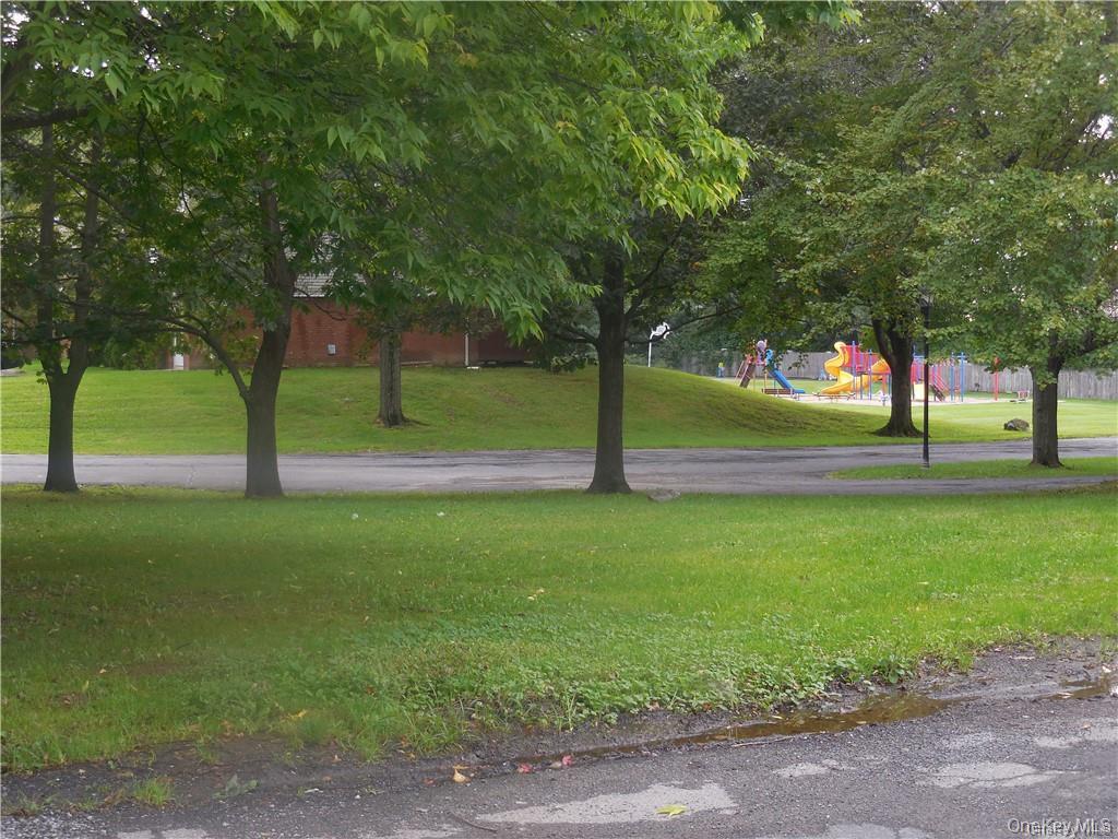 23 Brewster Road Cornwall, NY 12518 - Photo 37 of 39 View of community featuring a yard