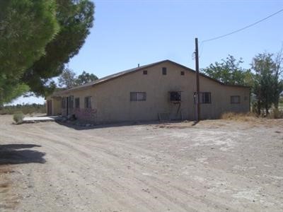 9995 Tradepost Road Lucerne Valley, CA 92356 - Photo 1 of 1 a backyard of a house