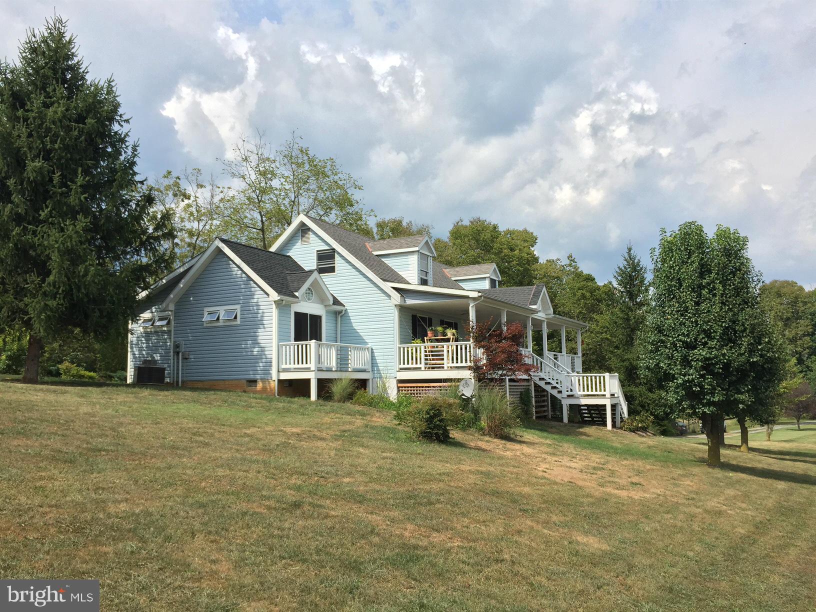 539 Turner Road Shepherdstown, WV 25443 - Photo 1 of 29 a house view with a garden space