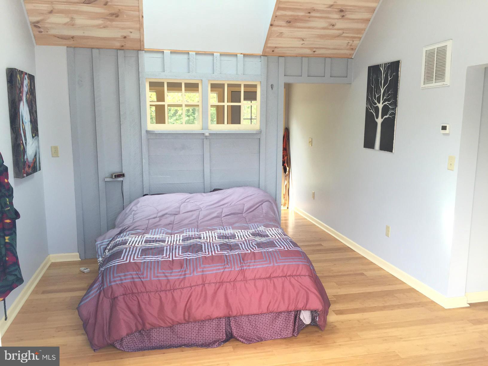 539 Turner Road Shepherdstown, WV 25443 - Photo 10 of 29 a bedroom with a bed and a window