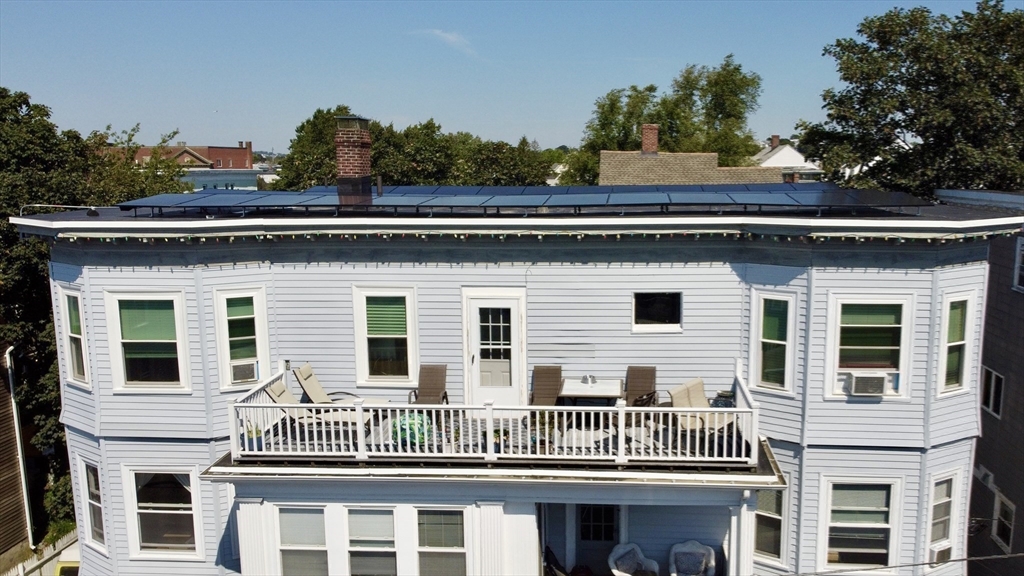 26 Forrest Street, Unit 3 Winthrop, MA 02152 - Photo 17 of 21 a front view of a house with a porch