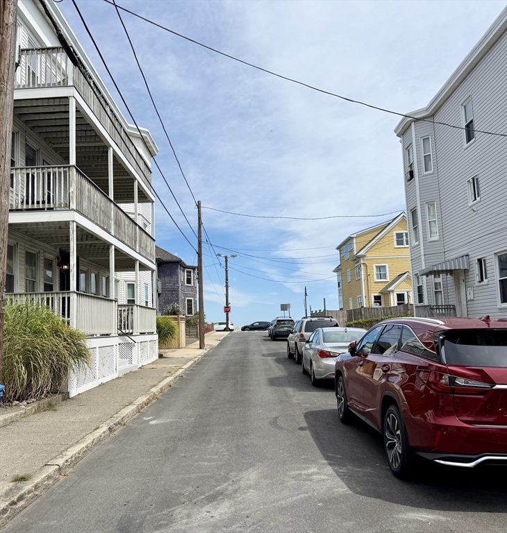 26 Forrest Street, Unit 3 Winthrop, MA 02152 - Photo 19 of 21 a cars parked in front of a building