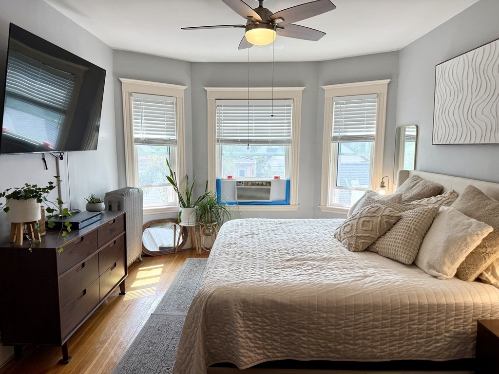 26 Forrest Street, Unit 3 Winthrop, MA 02152 - Photo 6 of 21 a bedroom with a bed and window