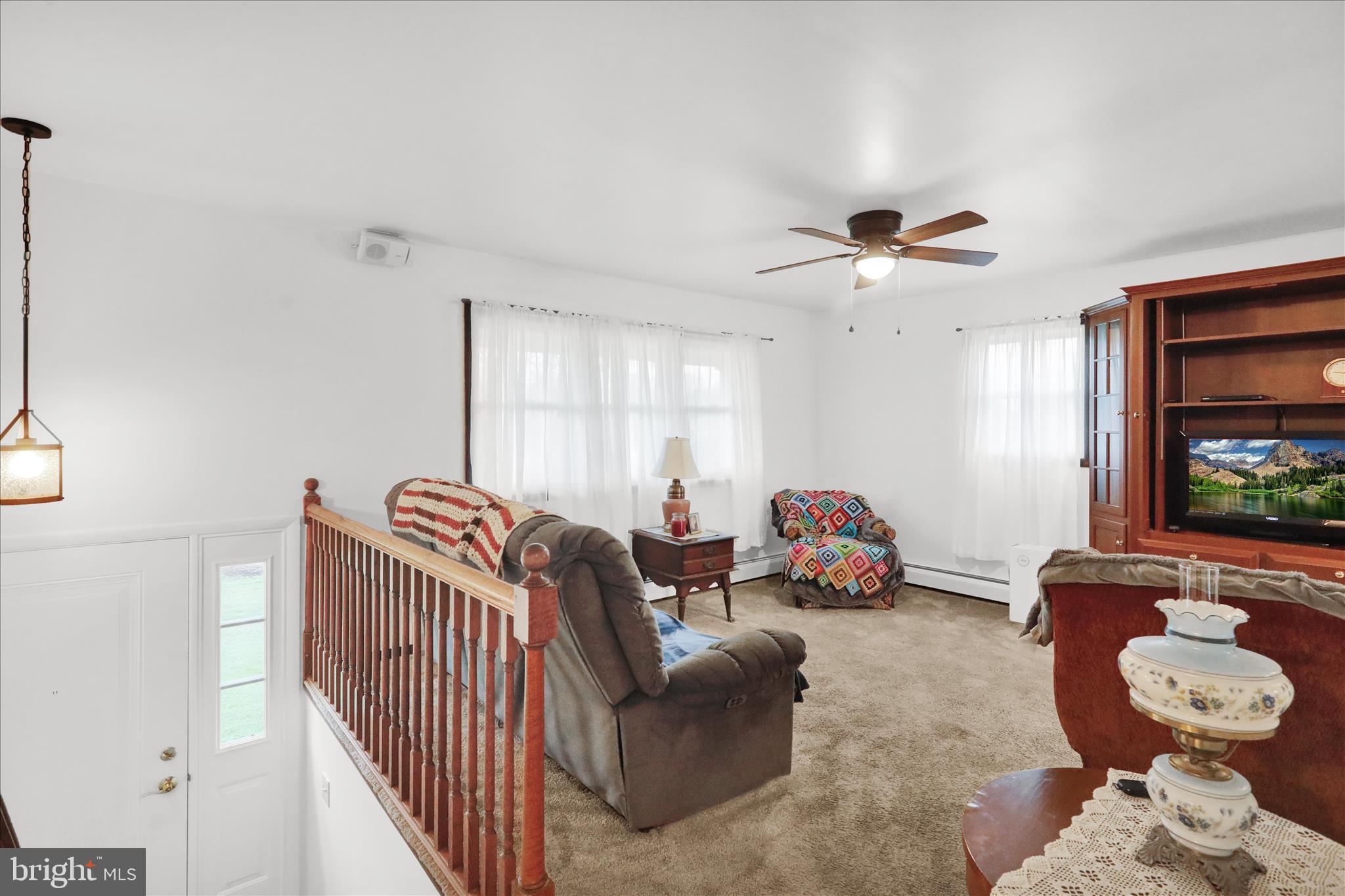 16 Mt Wilson Road Lebanon, PA 17042 - Photo 18 of 30 a living room with furniture and a flat screen tv