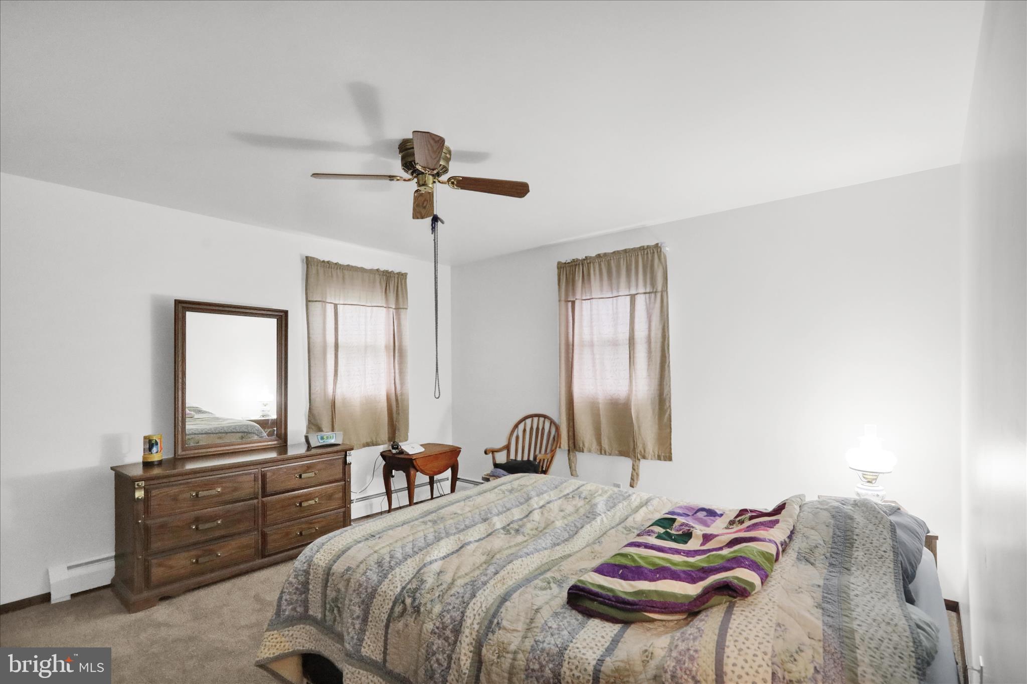 16 Mt Wilson Road Lebanon, PA 17042 - Photo 19 of 30 a bedroom with a bed and a chandelier