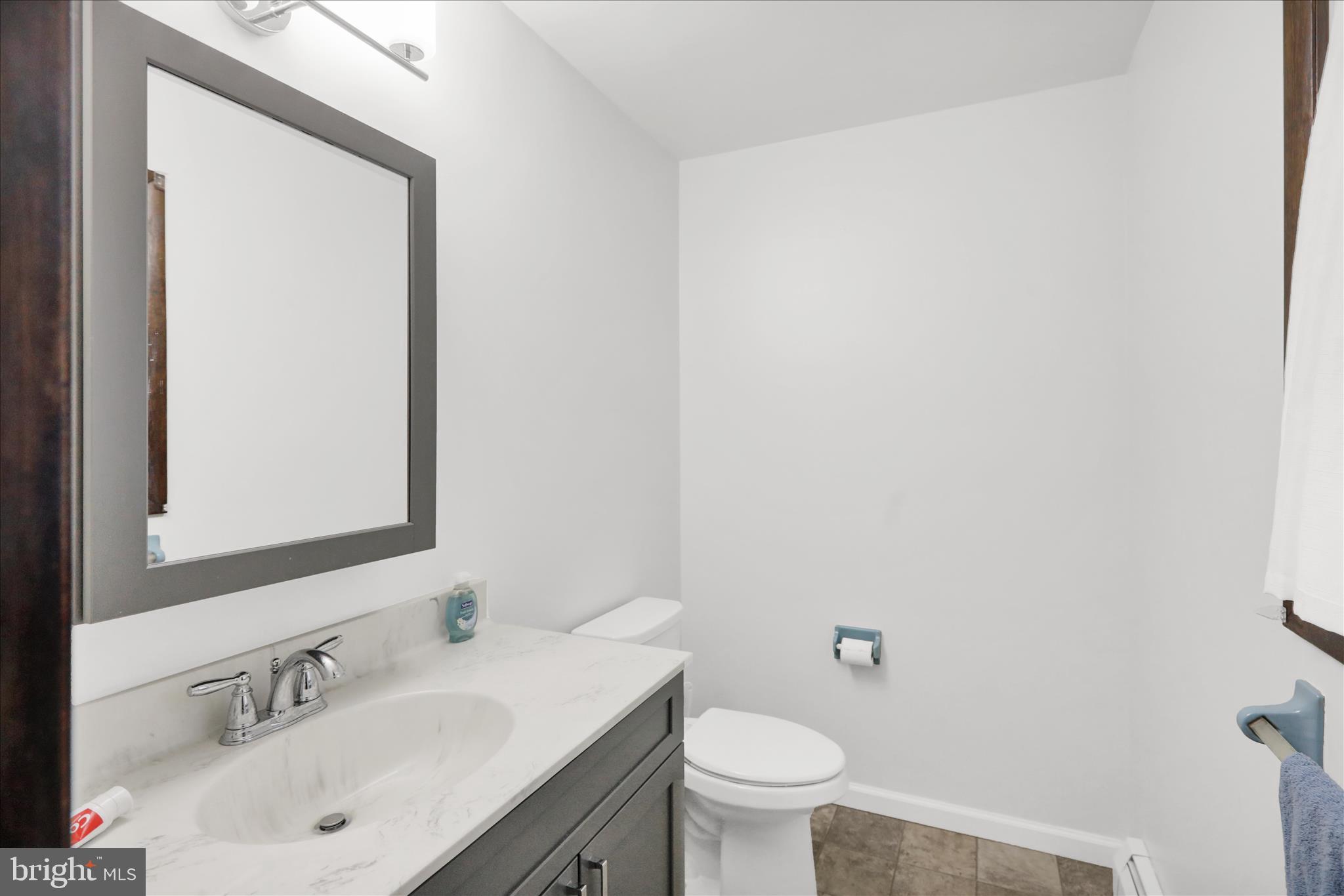 16 Mt Wilson Road Lebanon, PA 17042 - Photo 21 of 30 a bathroom with a sink toilet and mirror