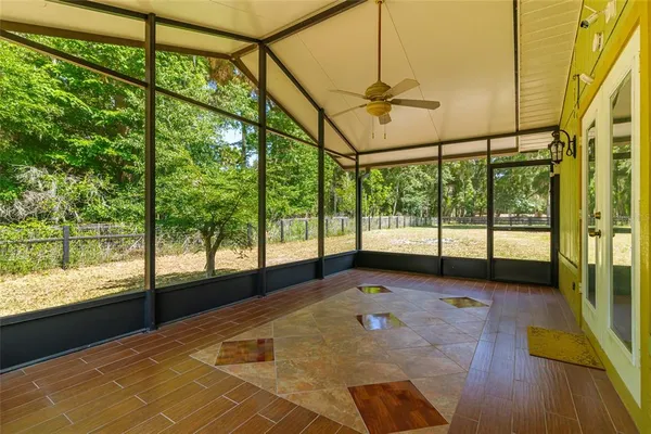 a room with furniture and gym equipment