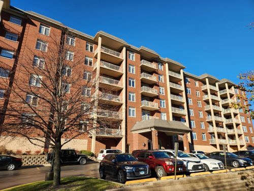 8440 Callie Avenue, Unit 410 Morton Grove, IL 60053 - Photo 1 of 27 a view of a building with a street