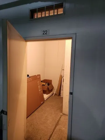 a view of workspace with furniture and window