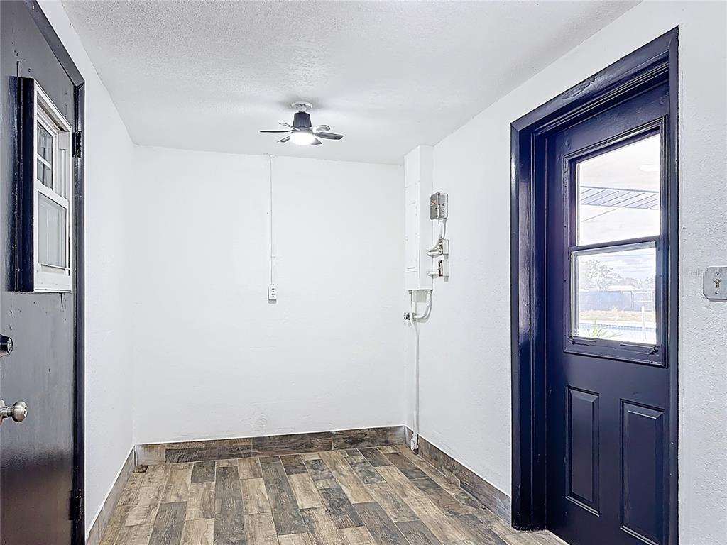 1890 Tyner Road Haines City, FL 33844 - Photo 12 of 48 a view of empty room with a window