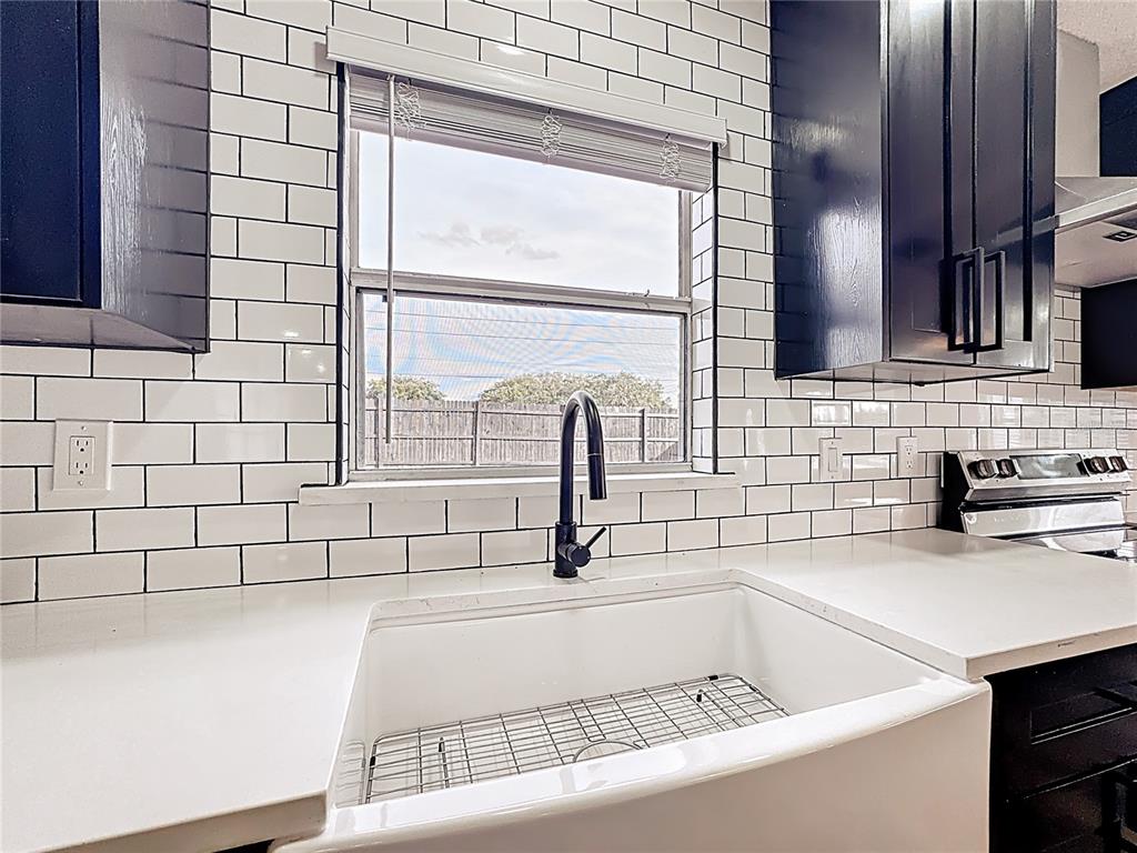 1890 Tyner Road Haines City, FL 33844 - Photo 16 of 48 a bathroom with a sink and a bathtub