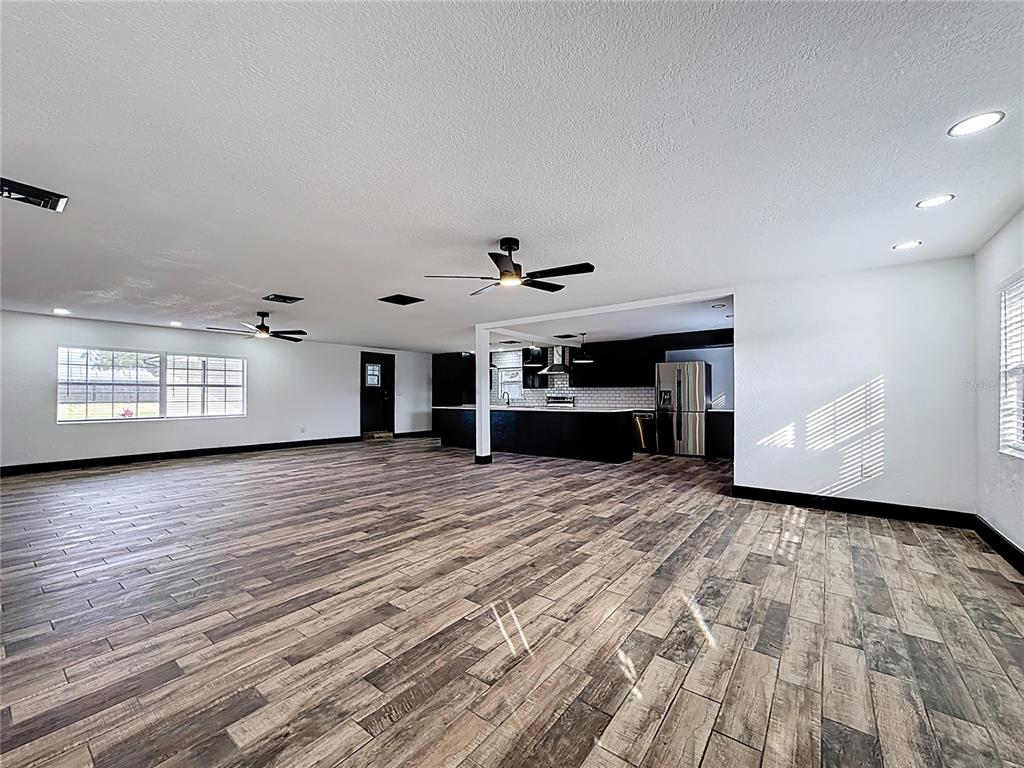 1890 Tyner Road Haines City, FL 33844 - Photo 22 of 48 a view of a livingroom with a fireplace