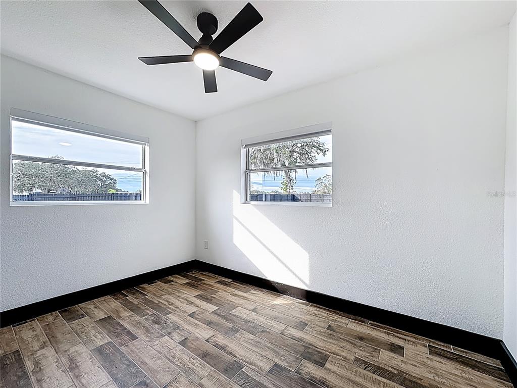 1890 Tyner Road Haines City, FL 33844 - Photo 25 of 48 a view of empty room with wooden floor