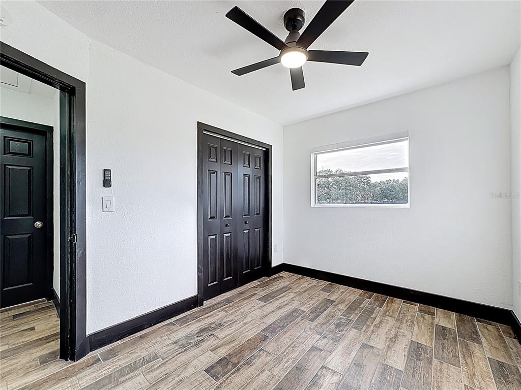1890 Tyner Road Haines City, FL 33844 - Photo 26 of 48 wooden floor in an empty room