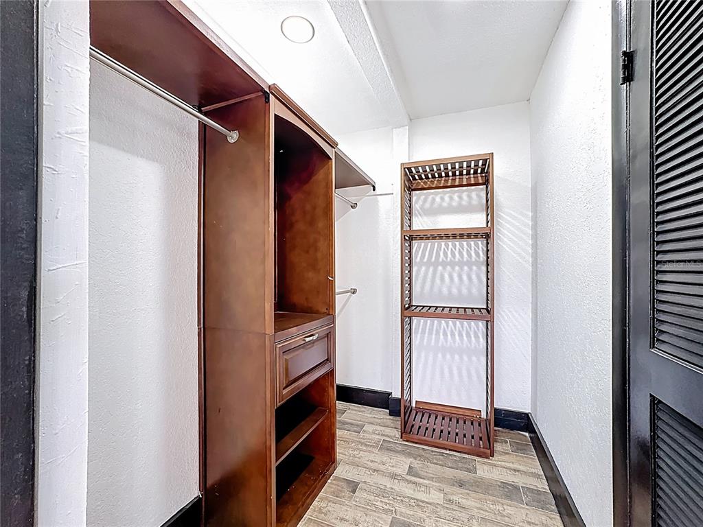1890 Tyner Road Haines City, FL 33844 - Photo 38 of 48 a view of a hallway with entryway wooden floor and front door