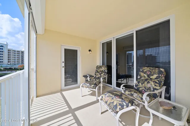 a view of a livingroom with furniture and front door
