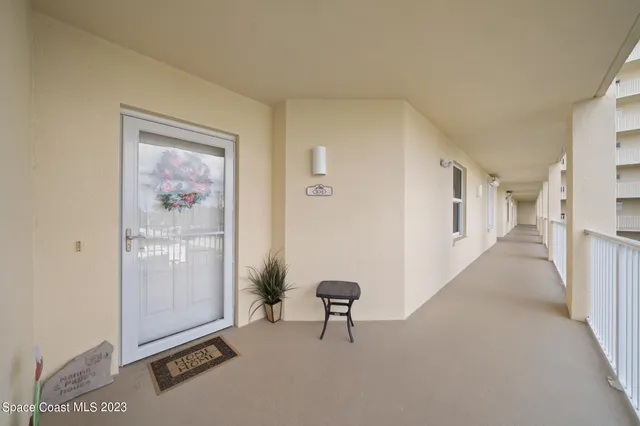 a view of a hallway with closet area