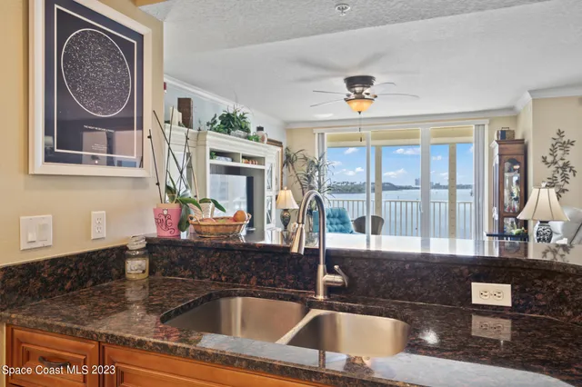 a kitchen with a sink and a window